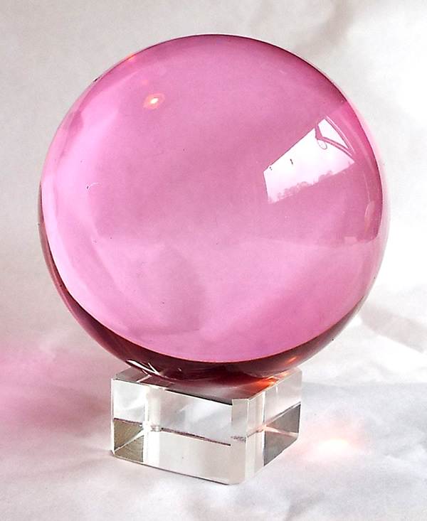 60mm crystal ball in a lovely soft pink. 